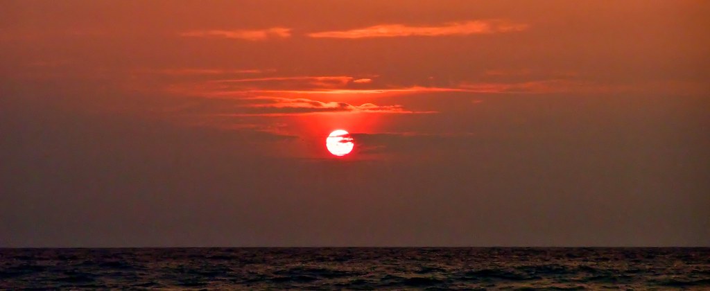 Golden hour sunset over the Sea of Marmara viewed from Sedef Island dining deck
